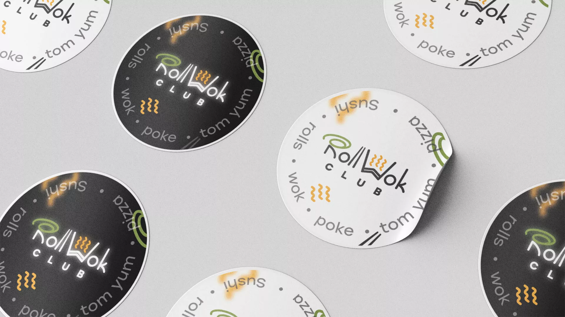 Разработка дизайна наклеек для суши-бара «Roll Wok Club» в Углегорске